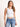 Model is wearing a white high neck crop tank.